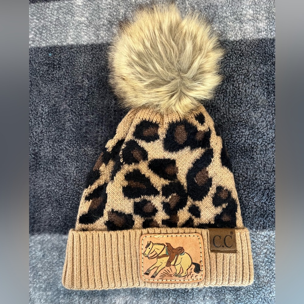 C.C Tan Leopard Beanie with Faux Fur Pom Horse Leather Patch